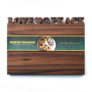 The Words with Boards Large Personalized Cutting Board 12.5" x 16" features LOVE and PEACE carved at the top with heart and peace sign symbols, and includes a Words with Boards, LLC label wrapped around it.