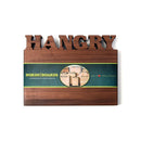 The Words With Boards Personalized Cutting Board Small 9.5" x 12.5" by Words with Boards, LLC features "HANGRY" carved on top and a green WORDS WITH BOARDS label—making it the perfect unique kitchen gift for any home chef.