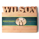 The Words With Boards Personalized Cutting Board Small 9.5" x 12.5" by Words with Boards, LLC features the name WILSON cut out at the top and a green WORDS WITH BOARDS band—an ideal custom hardwood gift for any home chef.