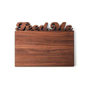 The Words With Boards Personalized Cutting Board (Small, 9.5" x 12.5") by Words with Boards, LLC features your chosen words carved in cursive at the top—a unique and charming kitchen gift that stands out above the board’s surface.