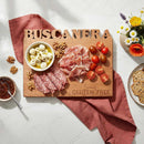 The Words With Boards Seriously Gluten Free Personalized Cutting Board (9.5" x 12.5") by Words with Boards, LLC displays cheese, salami, prosciutto, cherry tomatoes, walnuts & mozzarella for your gluten free spread. Crackers and jam are nearby.