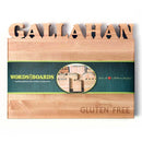 The Words With Boards Seriously Gluten Free Personalized Cutting Board (Small 9.5" x 12.5") by Words with Boards, LLC features your chosen name at the top and a green label for safe, gluten free cooking. Custom options available.