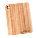 The Words With Boards Seriously Gluten Free Cutting Board Large 16” x 12.5” is a light hardwood board with a top left hole and “Seriously GLUTEN FREE” engraved in the bottom right, ideal for food separation and gluten free use.