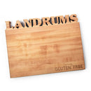 The Words With Boards Seriously Gluten Free Personalized Cutting Board by Words with Boards, LLC is a 16” x 12.5” wooden board with "LANDRUMS" at the top and "Seriously GLUTEN FREE" in the bottom right—ideal for gluten free kitchens.