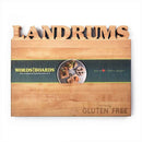 The Words With Boards Seriously Gluten Free Personalized Cutting Board (16" x 12.5") by Words with Boards, LLC features the name LANDRUMS cut out, a green food-themed band, and “Seriously GLUTEN FREE” engraved—perfect for custom kitchens.