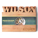 The Words with Boards Seriously Kosher Personalized Cutting Board Small (9.5” x 12.5”) by Words with Boards, LLC features “WILSON” at the top, a food-themed center label, and “Seriously KOSHER” engraved on the bottom right corner.