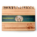 The Words With Boards Wedding Bells Personalized Cutting Board (12.5" x 16") by Words with Boards, LLC features custom names at the top, engraved wedding bells in the corner, and a green Words with Boards band—perfect for unique wedding gifts.