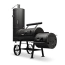 The Yoder Smokers Durango 20 Offset Smoker by Yoder Smokers features a vertical smoking chamber, horizontal main chamber, side firebox, two legs, and two wheels; shown on a white background.