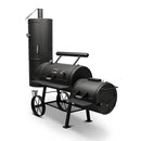 The Yoder Smokers Durango 20 Offset Smoker by Yoder Smokers has a black finish, vertical smoking chamber, horizontal cooking chamber, firebox, sturdy legs, and two wheels for support; shown on a white background.