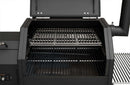 A close-up of the open Yoder Smokers YS480S Competition Pellet Grill with Stainless Steel Shelves shows two cooking racks, one elevated above the main grill, plus a lifted lid and part of the side shelf, ready for direct-flame grilling.