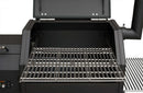 A close-up of the Yoder Smokers YS480S Competition Pellet Grill with stainless steel shelves shows the empty grilling area and part of the side shelf, ready for direct-flame grilling.