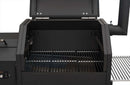 The Yoder Smokers YS480S Competition Pellet Grill by Yoder Smokers features stainless steel shelves, an open black grill with raised lid, metal grates, and an empty cooking area—perfect for direct-flame grilling.