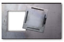 A smooth, brushed metal panel with a square cutout and a partially rotated, removable square cover—like the access panel for direct-flame grilling on the Yoder Smokers YS480S Competition Pellet Grill with Stainless Steel Shelves.
