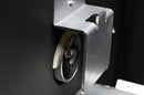 Close-up of the auger mechanism inside the Yoder Smokers YS480S Competition Pellet Grill with Stainless Steel Shelves, showing how the metal screw moves wood pellets from the hopper into the firebox for combustion and grilling.