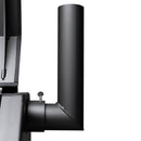 Close-up of a black, cylindrical metal chimney pipe attached to the Yoder Smokers YS480S Competition Pellet Grill with Stainless Steel Shelves. The focus is on the pipe structure and connection screw, with a plain background.