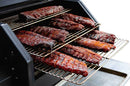 Several racks of saucy smoked pork ribs are stacked on the Yoder Smokers YS640 3-Tier Wire Smoking Rack by Yoder Smokers, optimizing vertical cooking space inside a smoker against a white background.
