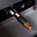 A close-up of a USB flash drive with orange accents, partially inserted into a port—ideal for storing recipes or guides for your Yoder Smokers YS640S Competition Pellet Grill with Wire Shelves and achieving that signature smoky flavor.