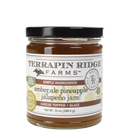 A 10 oz glass jar of Terrapin Ridge Farms Amber Ale Pineapple Jalapeño Jam with a black lid. This vegan jam pairs sweet heat flavor with hints of amber ale—perfect as a cheese topper or to add zing to your favorite dishes.