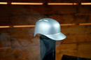 Silver Baseball Batting Helmet BBQ Chimney Cap - Silver with smoke venting from beneath this sports-themed grill accessory.