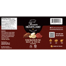 Texan Heartland Smokehouse Beef & Steak Seasoning label showcases bold smokehouse flavor, nutrition facts, and a savory blend of garlic, herbs, and spices. The package features a QR code for recipes and icons that highlight its versatility as both a steak seasoning and beef seasoning—ideal for BBQ, pork, and steak dishes. Weighing 5 oz, this product is proudly crafted in Texas by Texan Heartland.