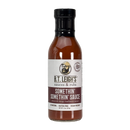 A bottle of B.T. Leigh’s Sweet & Tangy BBQ Sauce featuring a label with an illustration of a man with a beard and a cap.