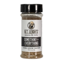 A B.T. Leigh’s All Purpose Salt, Pepper, & Garlic Seasoning spice jar with a black lid and a white label featuring a bearded man in a baseball cap, labeled SOMETHIN for EVERYTHING smoky salt, pepper & garlic blend.