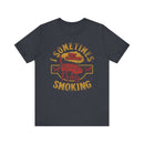 Sometimes I Get Caught Smoking Barbecue T-Shirt with soft cotton fabric and humorous grillmaster design
