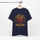 Sometimes I Get Caught Smoking Barbecue T-Shirt with soft cotton fabric and humorous grillmaster design
