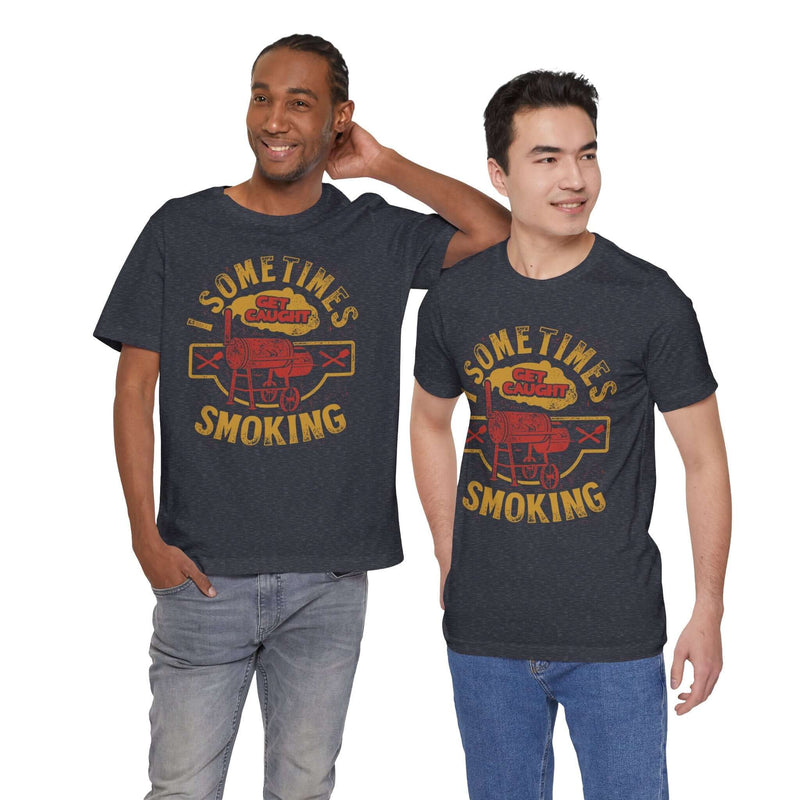 Sometimes I Get Caught Smoking Barbecue T-Shirt with soft cotton fabric and humorous grillmaster design