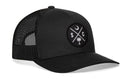 The Haka Hat South Carolina Trucker Hat is a black mesh-back snapback featuring a circular patch with a crescent moon, tree, and S and C crossed on the front.