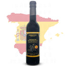 A bottle of Georgetown Olive Oil Co. Spanish Olio Nuovo UHP | Ultra High Polyphenols extra virgin olive oil is displayed in front of a faded map of Spain alongside the Spanish flag.
