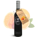 A bottle of Georgetown Olive Oil Co. Spicy Citrus Habanero White Balsamic, crafted by Georgetown Olive Oil Co., from Modena, Italy. The neck is adorned with a tan paper tag displaying illustrations of oranges and habanero peppers, while a subtle, oversized image of both an orange and habanero pepper appears in the background.