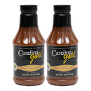 Two bottles of Gourmet Carolina Gold Sweet Vinegar Carolina Gold BBQSauce with black labels and caps.