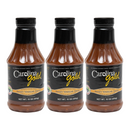 Three identical bottles of Gourmet Carolina Gold Sweet Vinegar Carolina Gold BBQSauce with black caps and labels featuring gold and black text.