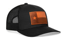 The Haka Hat Texas Flag Trucker Hat features a black mesh back, brown leather patch with a single star and rectangular design, offering a classic Texas Flag Snapback style—perfect for fans of Haka Hat.