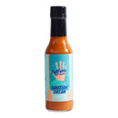 A bottle of Culture Hot Sauce Tahitian Dream from Culture Hot Sauce, featuring a blue and peach label with a hand and wave graphic. This vibrant, orange tropical hot sauce promises bold island-inspired flavor in every drop.