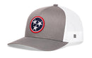 Show your Tennessee pride with the Haka Hat Tennessee Flag Trucker Hat—this gray and white mesh snapback features a circular TN state flag patch on the front.