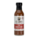 A bottle of B.T. Leigh’s Magical Mop Carolina Vinegar Sauce with a harissa-inspired flavor profile, featuring a label with a logo of a man in a hat and glasses.
