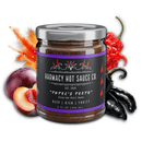 A jar of Harmacy Hot Sauce Co. Totec's Teeth Extra Hot Pasilla & Plum Sauce 9oz sits before a plum, chili pepper, black pepper, and flames—blending fruity notes with super-hot peppers for intense flavor.
