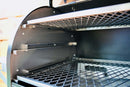 Two Pimp My Grill® Gen2 Slide-Out Rack System racks installed inside a Traeger Ironwood 650 / Redland pellet grill chamber to expand cooking capacity.