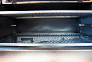 Interior of a barbecue grill featuring the Pimp My Grill® Gen2 Slide-Out Rack System - 2 Racks, with two stacked, slide-out metal wire racks that expand cooking capacity.