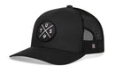 The Haka Hat Tucson Trucker Hat (Black TUS X Snapback) features a mesh back and round patch with crossed lines, U, S, T letters, and a trident symbol—offering classic bold style from Haka Hat.
