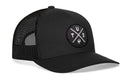 The Haka Hat Tucson Trucker Hat | Black TUS X Snapback features a mesh back, round patch with white symbols in four sections, and classic snapback style—combining comfort and flair for any outfit from Haka Hat.