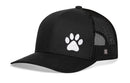 The Haka Hat Paw Trucker Hat is a black snapback from Haka Hat featuring a white embroidered paw print on the front and a black mesh back.