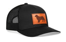 The Haka Hat Golden Retriever Trucker Hat features a black leather patch and classic snapback style, perfect for fans of unique Haka Hat dog-themed trucker hats.