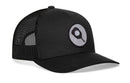 The Haka Hat Pickleball Trucker Hat is a black mesh snapback featuring a round embroidered patch with a pickleball paddle and ball graphic on the front.