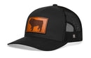The Haka Hat English Bulldog Trucker Hat features a black mesh design, brown leather patch with an English bulldog, curved brim, and structured front for classic trucker style. Adjustable snapback closure. Brand: Haka Hat.