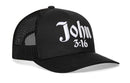 The Haka Hat John 3:16 Trucker Hat is a black Christian snapback featuring white 3D puff embroidery of "John 3:16" on the front.