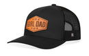 The Haka Hat Girl Dad Leather Trucker Hat is a black mesh snapback with a curved brim and a brown “GIRL DAD” patch on the front, surrounded by five stars. Brand: Haka Hat.