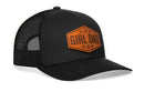 The Haka Hat Girl Dad Leather Trucker Hat features a black mesh snapback design and a brown hex patch reading "GIRL DAD" with five stars—perfect for proud fathers.